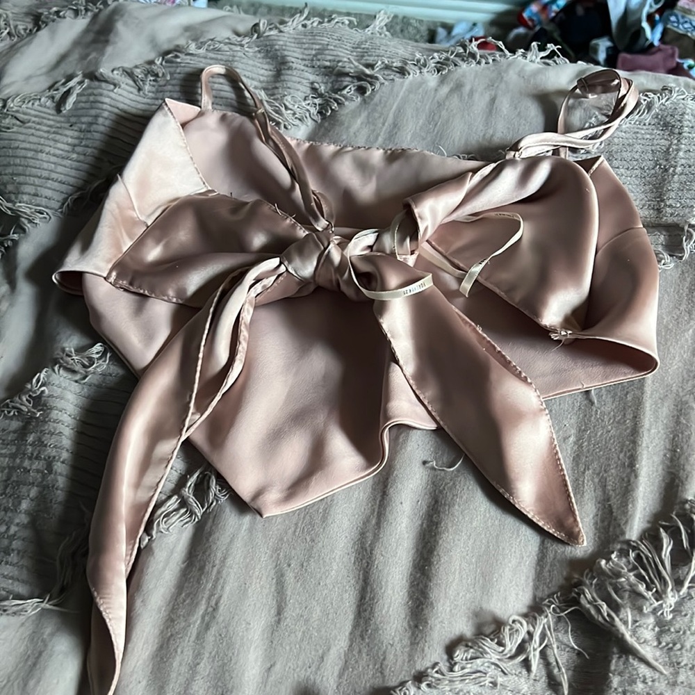 Super cute silky with tied back and adjustable strap bandanna top